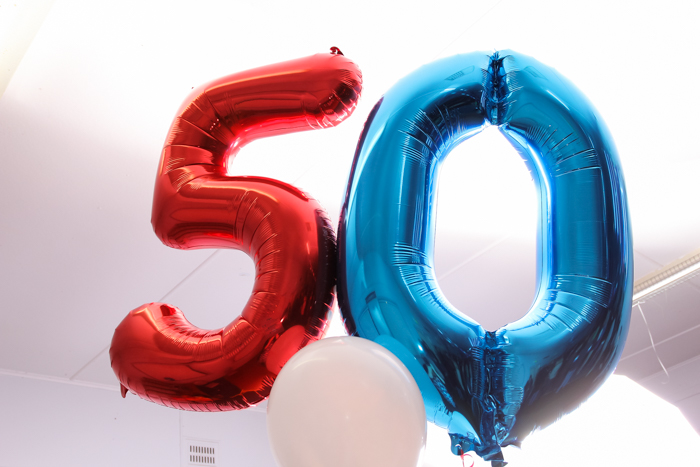 red and blue giant foil balloon number 50 for birthday 