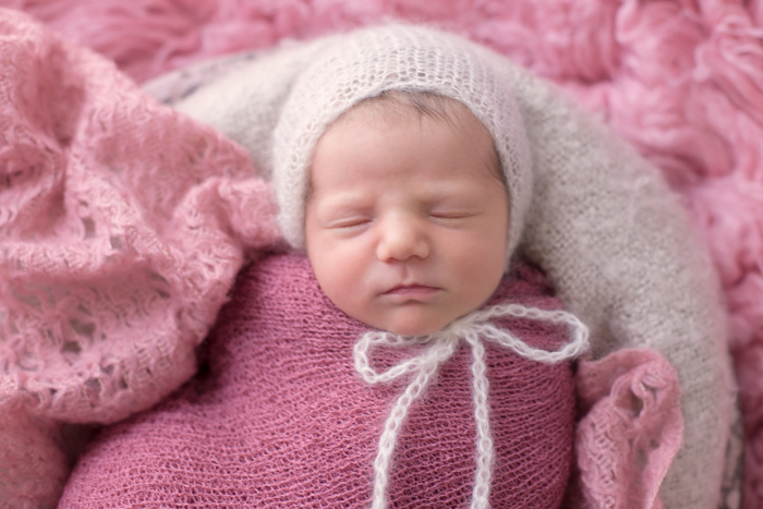 tamworth newborn photography photographer baby posed on pink