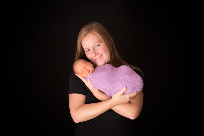 Mum and bub pose on black backdrop - newborn photography tamworth nsw